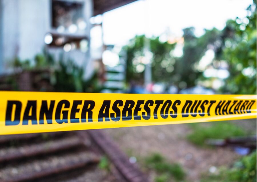 Signage saying to be aware of asbestos